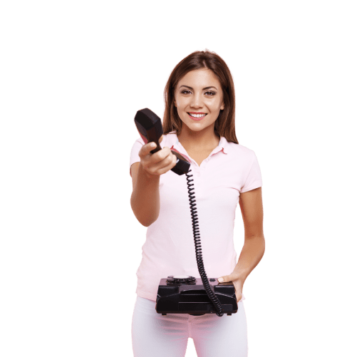 mujer sosteniendo un teléfono fijo con la mano